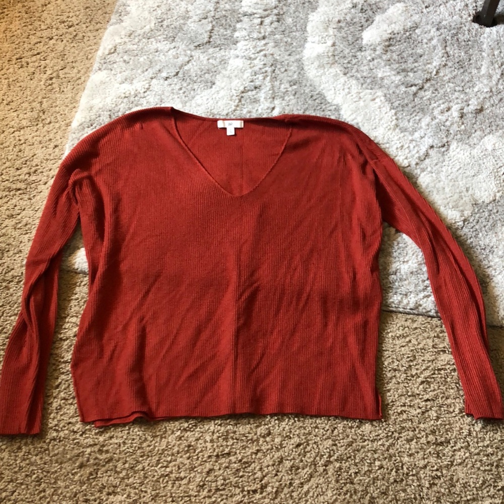 Short orange/rust sweater